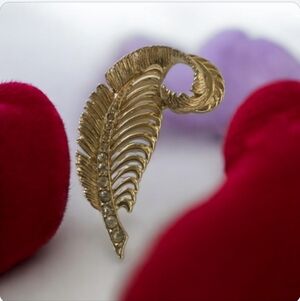 GERRY whimsicle Gold toned Leaf with white sapphires pin in back From 1980's